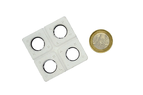 Componente tecnico con inserto plastico